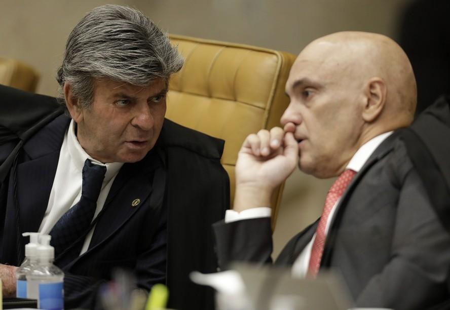 Os ministros do Supremo Tribunal Federal (STF) Luiz Fux (à esq.) e Alexandre de Moraes durante sessão da Corte em fevereiro passado